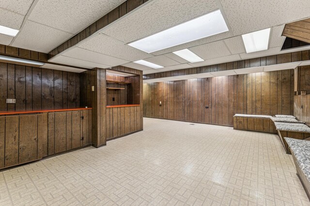 unfurnished room featuring light colored carpet, a textured ceiling, and rail lighting