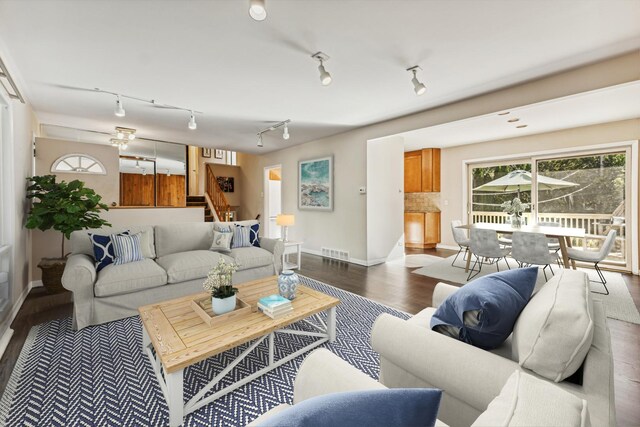 unfurnished living room featuring beam ceiling and wood walls