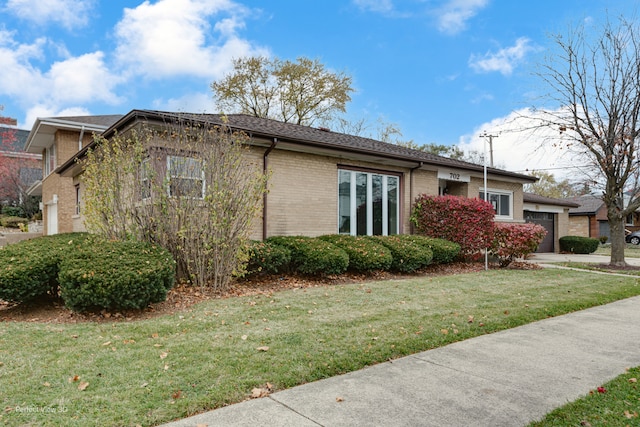 view of home's exterior with a yard