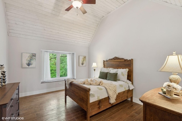 bedroom featuring ceiling fan, baseboards, dark wood finished floors, wood ceiling, and vaulted ceiling