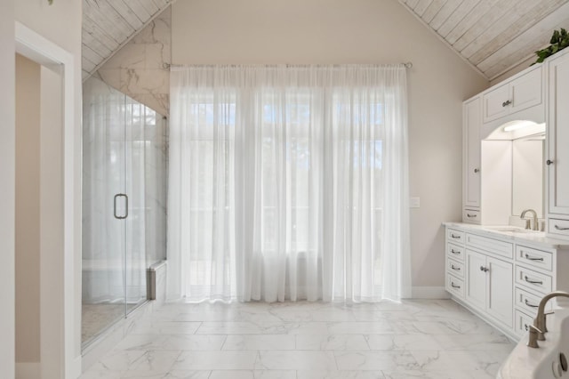 bathroom featuring marble finish floor, wood ceiling, vanity, and lofted ceiling