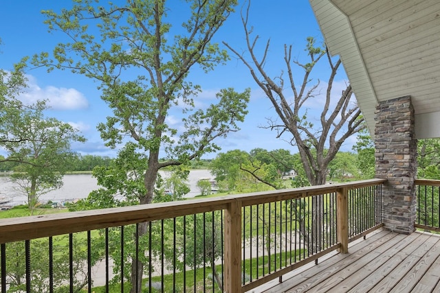 deck featuring a water view