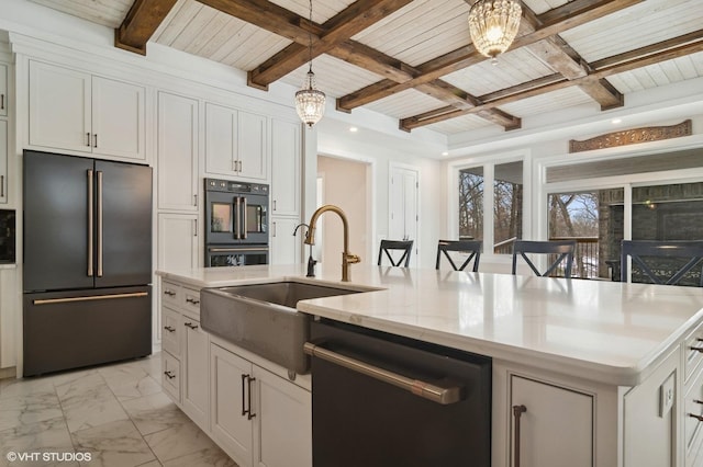 kitchen featuring dishwashing machine, high end fridge, a sink, white cabinets, and marble finish floor