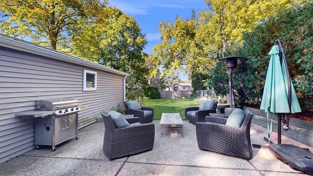 view of patio with an outdoor living space and a grill