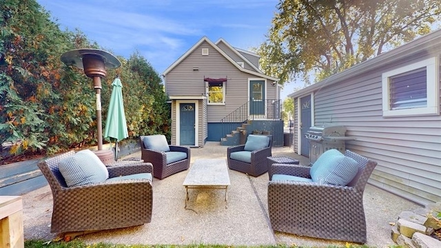 view of patio with a grill and an outdoor hangout area