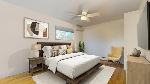 bedroom with ceiling fan, a baseboard heating unit, a wall mounted AC, and light wood-type flooring