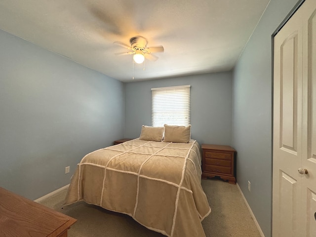 bedroom with carpet flooring and ceiling fan