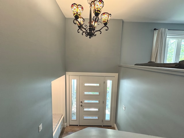 entrance foyer featuring a chandelier