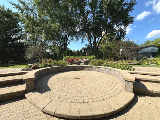 view of property's community featuring a patio