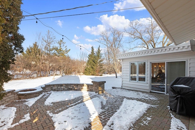 exterior space featuring area for grilling and an outdoor fire pit