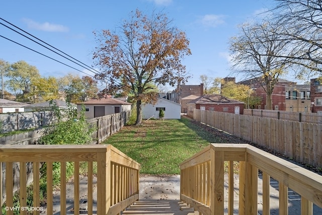 view of yard with a wooden deck