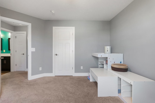 view of carpeted home office