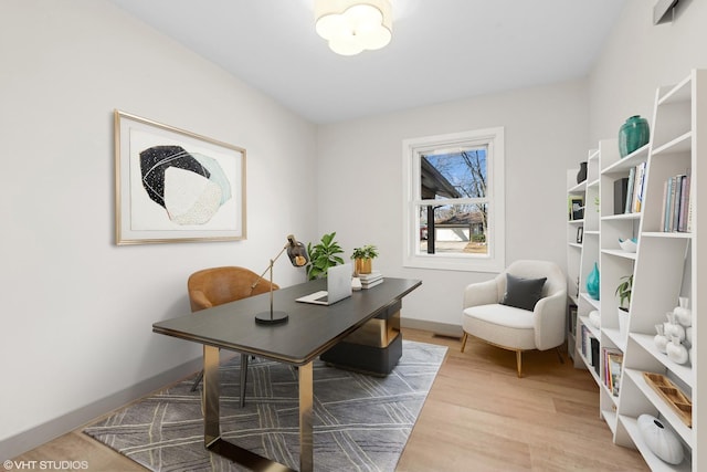 office space with hardwood / wood-style flooring