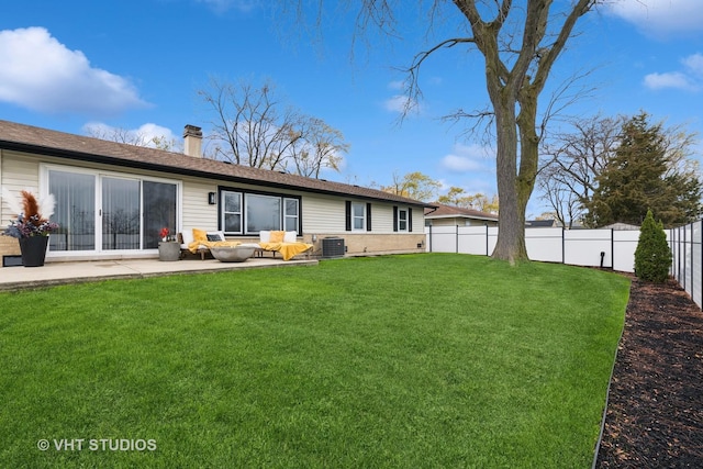 back of property with cooling unit, a yard, outdoor lounge area, and a patio area