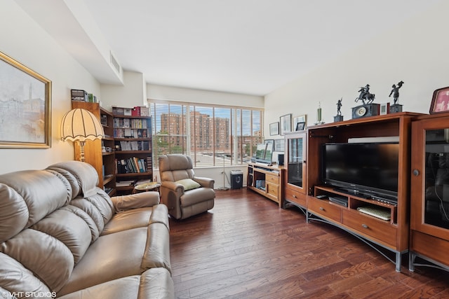 living room with dark hardwood / wood-style floors