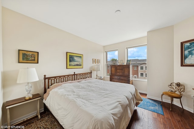 bedroom featuring dark hardwood / wood-style floors