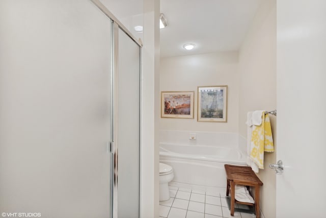 bathroom with separate shower and tub, toilet, and tile patterned floors