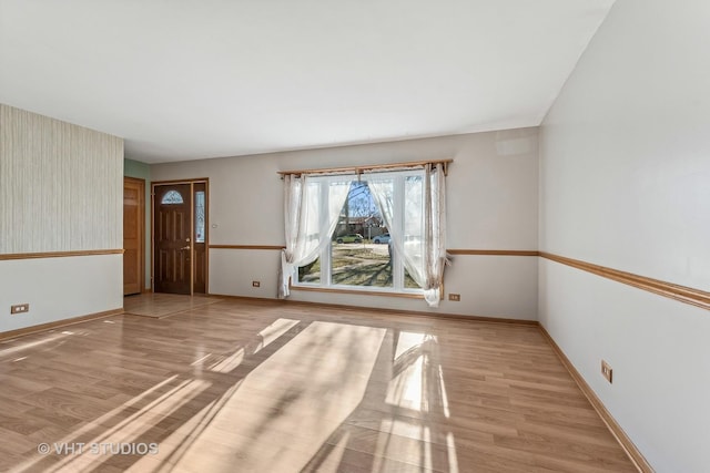 empty room with light wood-type flooring