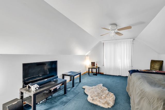 carpeted bedroom featuring ceiling fan and vaulted ceiling