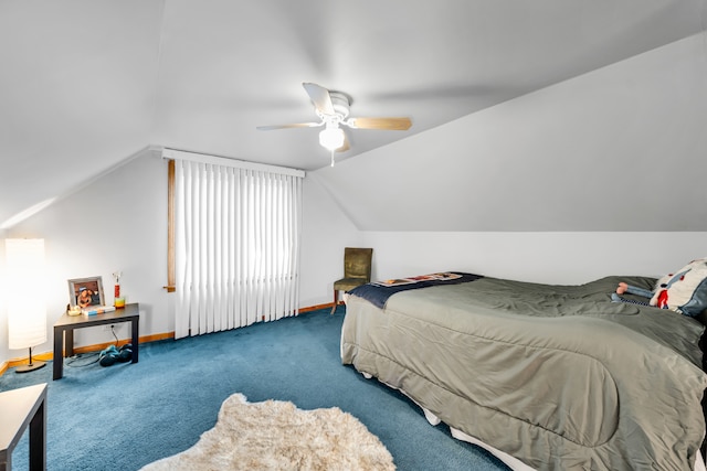 carpeted bedroom featuring vaulted ceiling and ceiling fan