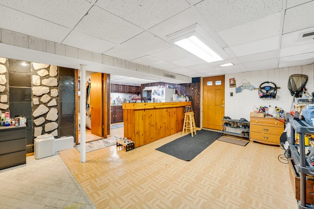 interior space featuring bar area