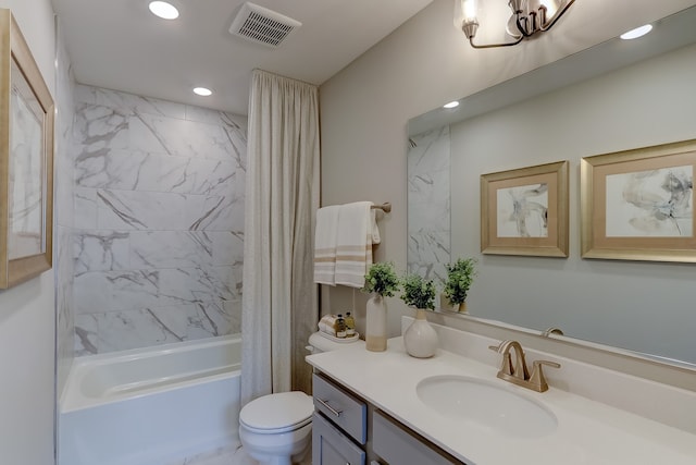 full bathroom featuring toilet, vanity, and shower / bath combo with shower curtain