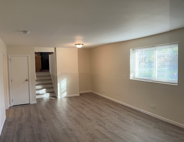 spare room featuring hardwood / wood-style flooring