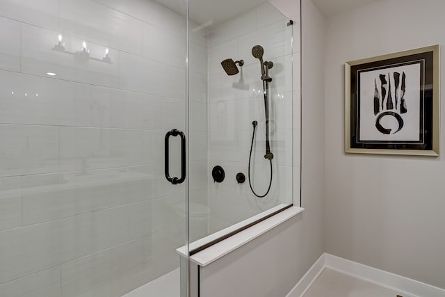 bathroom featuring an enclosed shower