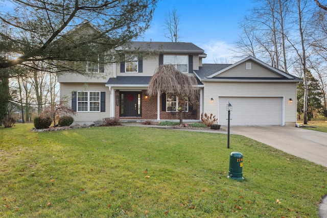 view of front property with a garage and a front lawn