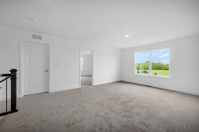 view of carpeted spare room