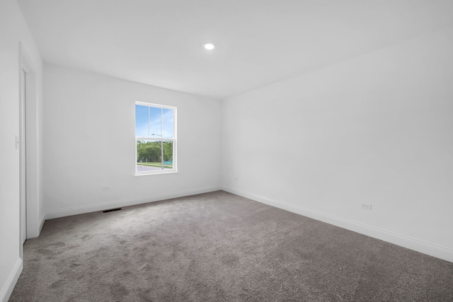 spare room with carpet