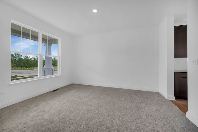 view of carpeted spare room