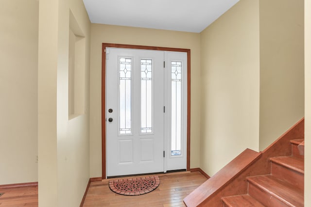 entryway with light hardwood / wood-style floors and a wealth of natural light