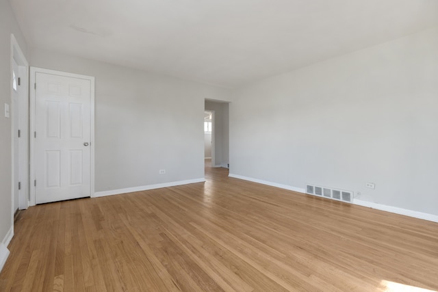 unfurnished room featuring light wood-type flooring