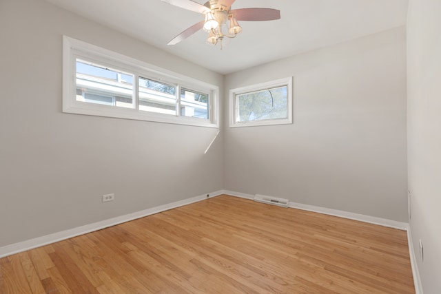 unfurnished room featuring ceiling fan and light hardwood / wood-style floors