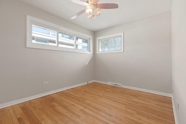 1367 Buffalo Ave, Calumet City, IL 60409 - empty room with light wood-type flooring, baseboards, and ceiling fan