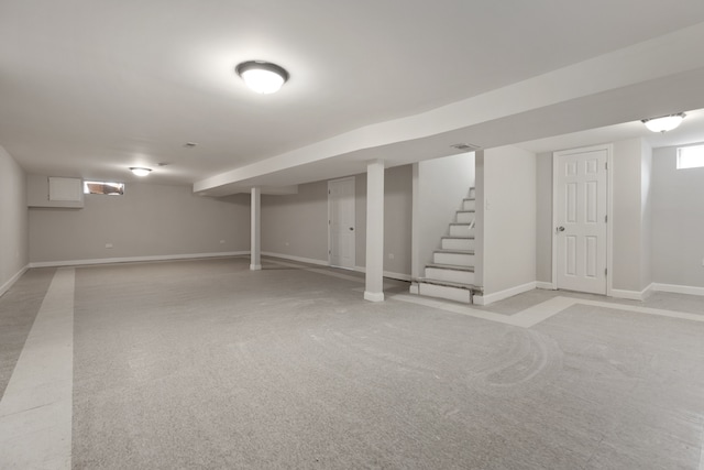 basement with light colored carpet