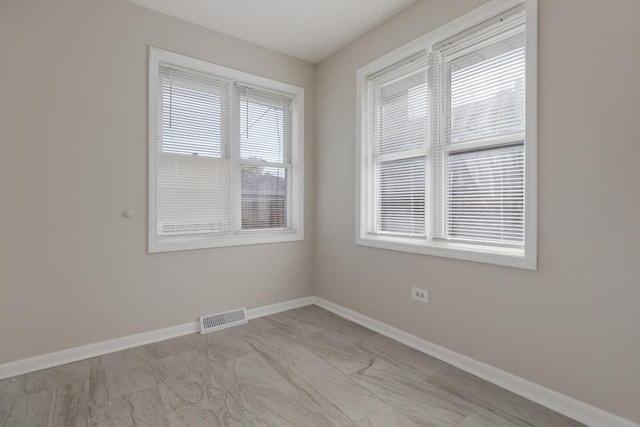 1367 Buffalo Ave, Calumet City, IL 60409 - unfurnished room with baseboards and light marble finish flooring