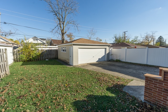 garage with a lawn