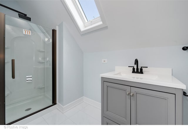 bathroom featuring walk in shower, vanity, and vaulted ceiling