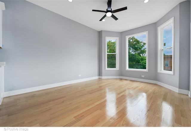 unfurnished room with light hardwood / wood-style floors and ceiling fan