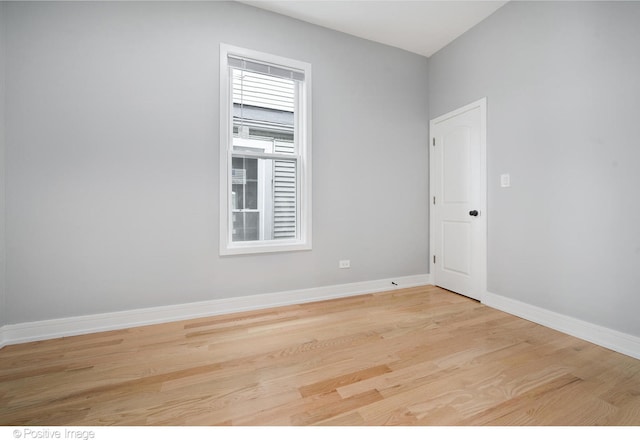 unfurnished room featuring light hardwood / wood-style floors