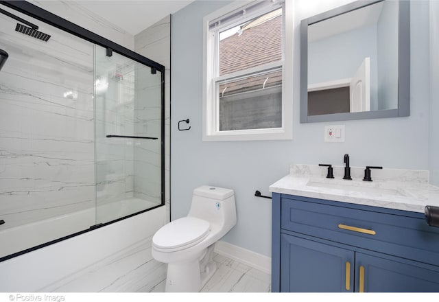 full bathroom featuring toilet, combined bath / shower with glass door, and vanity