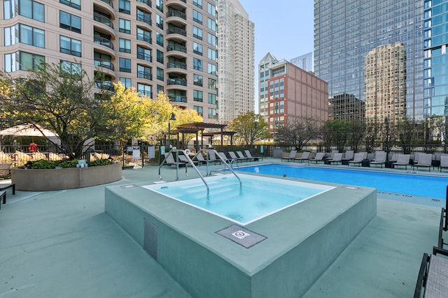 view of pool with a pergola