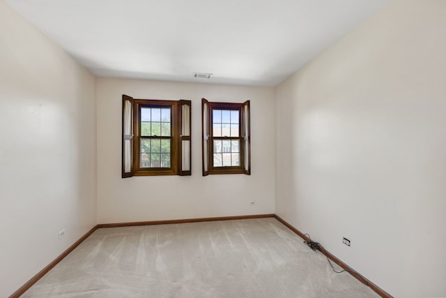 view of carpeted spare room