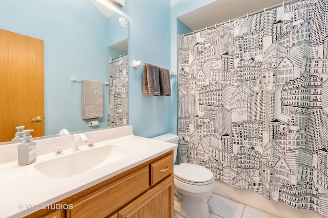 bathroom with a shower with curtain, tile patterned flooring, vanity, and toilet