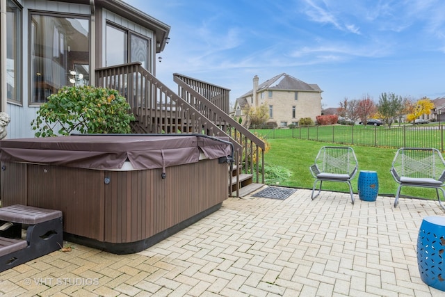 view of patio with a hot tub