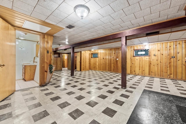 basement with wood walls