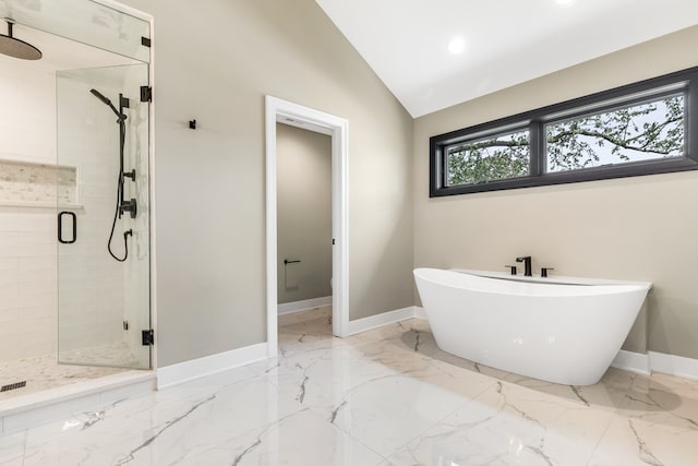 bathroom with independent shower and bath and vaulted ceiling