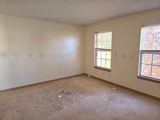 view of carpeted spare room